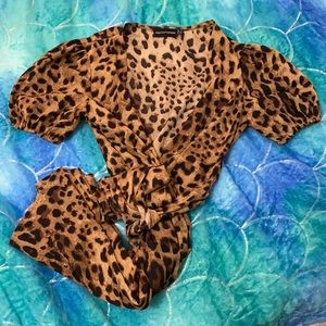 This is cheetah print dress from Pretty Little Thing. Multi-wear across settings